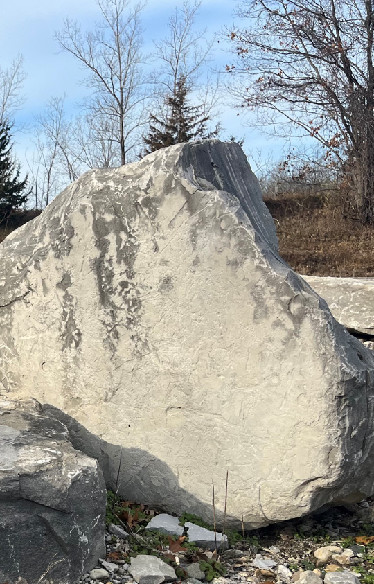 Large decorative stone used as a feature or for attaching or engraving signage