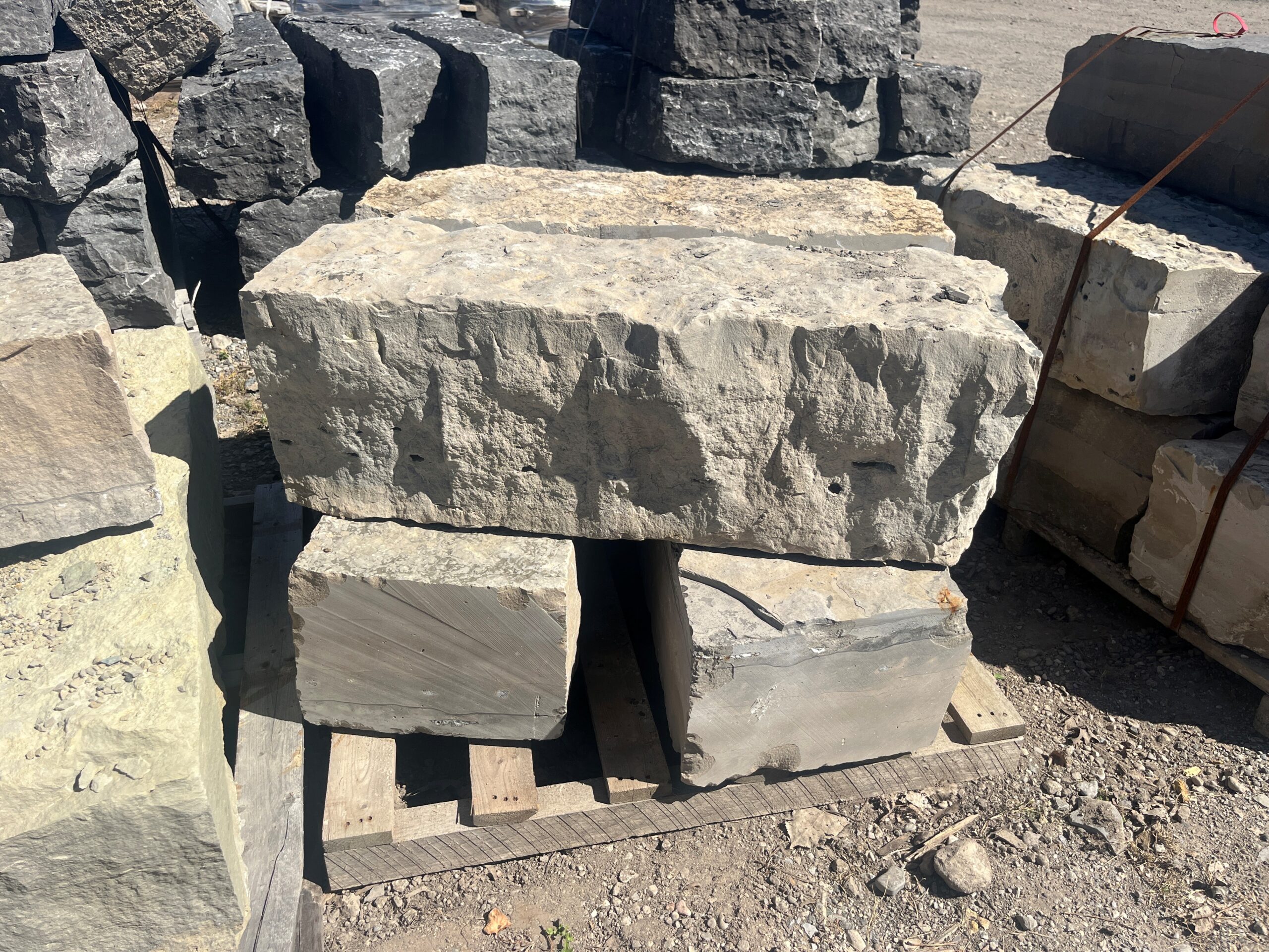 Tan 12″ Guillotine Tan-coloured 12-inch Guillotine stone block with a natural split face, ideal for garden walls, borders, and landscape accents.